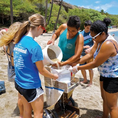 Students collect sand samples at Hanauma Bay