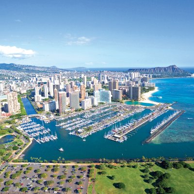Drone image of Waikiki Harbor with diamond head in the background