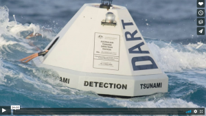 a floating object sits on the water that states 'Australian Tsunami Detection Station'