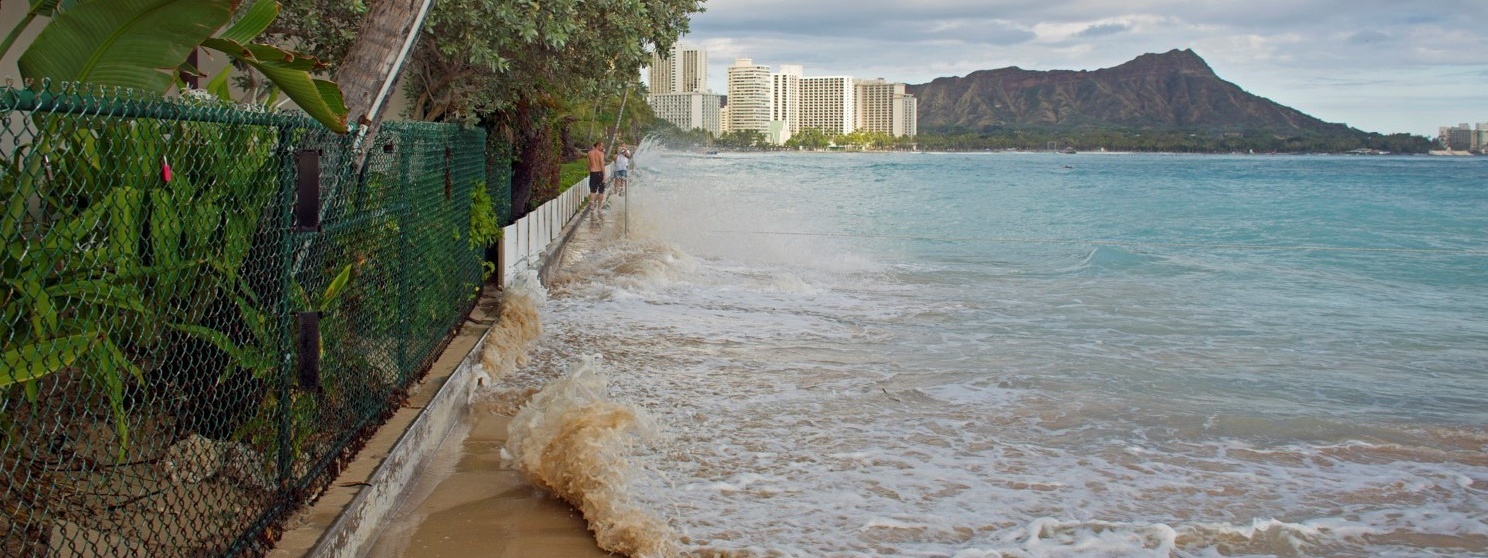 The shoreline at king tide crashes into Waikiki homes