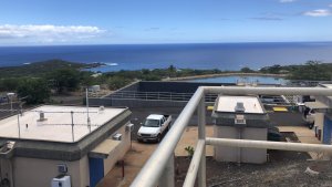 View over a water treatment plant by the ocean