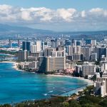 Developing design flood elevations and envisioning sea-level rise adaptation strategies for a densely developed coastal community, Waikīkī, Hawai‘i for improved outcomes for communities, economy, and the stewardship of marine resources